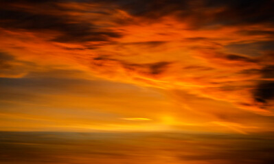 Naklejka na ściany i meble Colorful sky at sunset. Abstract defocused sky gradient.