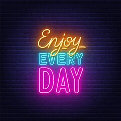 Plakat Enjoy Every day neon quote on brick wall background.
