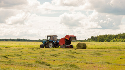 Harvesting of agricultural feed in the field.
