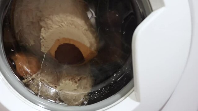 Soft toy brown bear is washable in the washing machine
