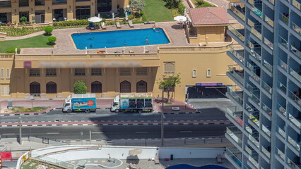 Rooftop swimming pool viewed from above timelapse, Aerial top view at JBR district.