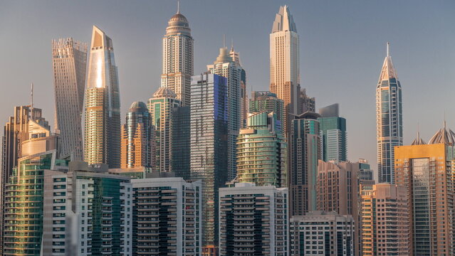 Dubai marina tallest block of skyscrapers timelapse. © neiezhmakov