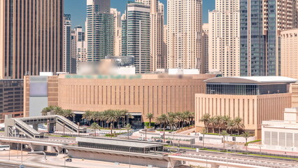 Fototapeta na wymiar Dubai marina skyscrapers around shopping mall aerial timelapse from above.