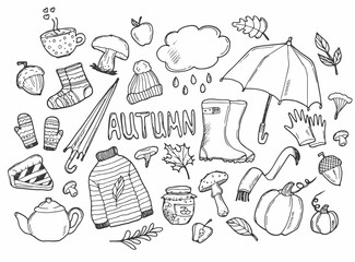 Obraz premium Autumn doodles. Hand drawn set of sketches: rubber boots,cloud, book, cup of tea, sweater, umbrella, pie, apple, mushrooms, leaves, flowers etc. Isolated objects on white background