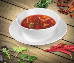Spicy red chicken soup. Chicken vindaloo. Butter chicken Murgh Makhani curry Indian spices hot and spicy gravy dish.