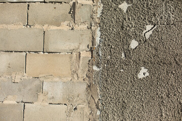 Concrete wall. Raw wall surface. Stonework.