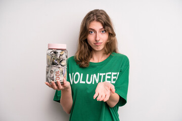 young girl with a donation banknotes bottle. volunteer concept