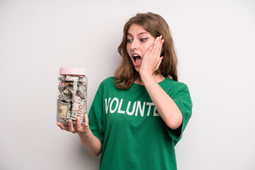 young girl with a donation banknotes bottle. volunteer concept