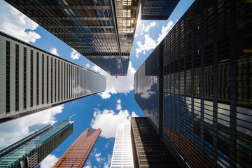 Business and finance concept, looking up at modern office building architecture in the financial district of Toronto, Ontario, Canada. - 513717368