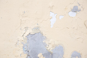 Beige background of the plastered wall. Close up.