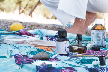 woman testing aromatherpy oils on a summertime mindfulness ritual.