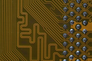 microprocessor on the background of the microcircuit of the motherboard.