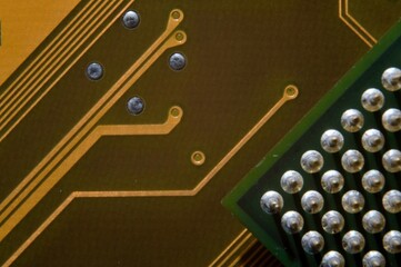 microprocessor on the background of the microcircuit of the motherboard.