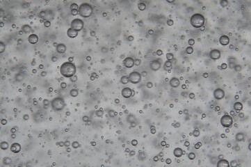 air bubbles in a transparent liquid close-up. micro