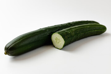 green cucumber on a white background