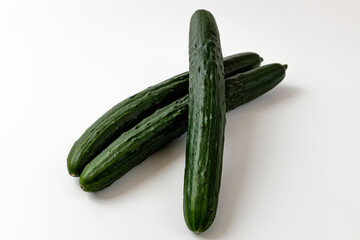 green cucumber on a white background