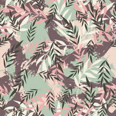 Green tropical leaves on an abstract background. Blots and leaves. Summer floral background