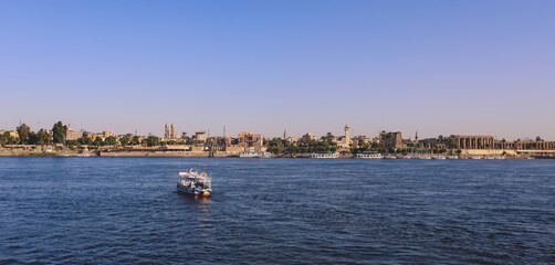 Fototapeta na wymiar Panoramic View to the Luxor City Scape from the Nile River Side, Egypt
