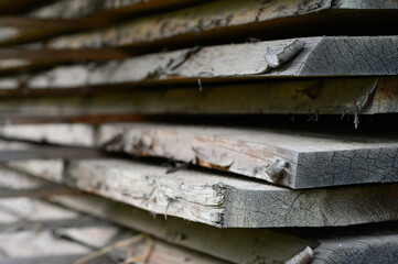 Lots of boards. Boards are stacked. Building materials. Warehouse of wooden products.