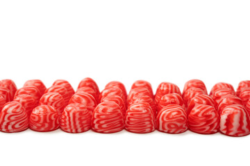 Red round tasty gummy candies islolated on a white background.