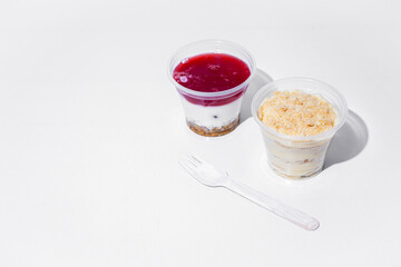 Yoghurt with jam, nuts and sesame seeds