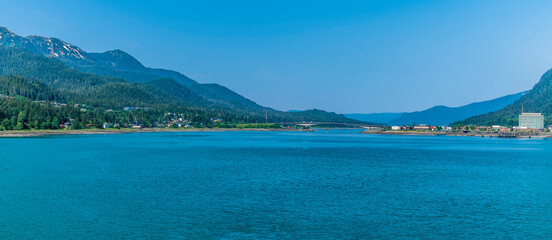 A panorama view across the harbour entrance of Juneau, Alaska in summertime