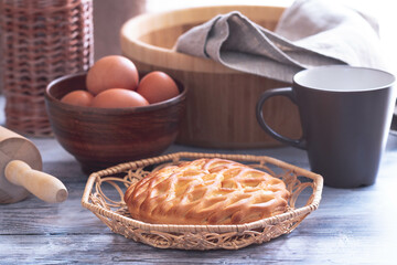 Fresh homemade open pie with cottage cheese and raisins. Traditional Russian yeast pastries, cheesecake, round buns, cottage cheese pie. Buns with cottage cheese and raisins.