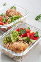 Chicken breast, quinoa and vegetables in lunch box. Top view. Flat lay