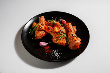 Raw marinated chicken legs