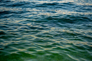 Detail of sea water color with green bluish gradient