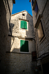 Empty morning streets in mediteranean historical city Trogir in Croatia