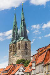 Fototapeta na wymiar Church towers and half timbered houses in historic city Quedlinburg, Germany