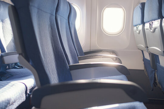 Empty seat on airplane while covid-19 outbreak destroy travel and airline business
