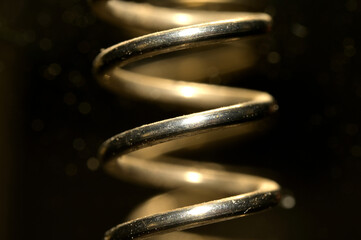 Close up of a compression spring made of steel, India.