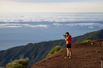 Obraz premium man photographer in El Teide national park Tenerife Canary islands