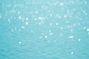 White gold abstract lights. Festive glitter blur Bokeh background. Defocused backdrop. Abstract bokeh lights with soft blue, water, ocean, sea light background illustration, backdrop.
