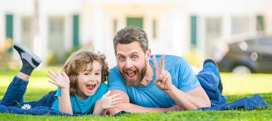 Banner of father and son in summer park outdoor. childhood and parenthood. parent relax with little...