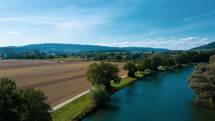 Drone view over the river and fields in the city of Zurich, Switzerland