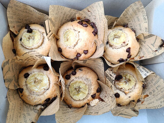 Top view, Homemade banana bread or cupcakes on top chocolate chips