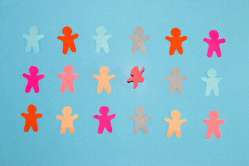 break the pattern, colorful paper people on a pastel blue background, all people lie down, one stood up, modern design