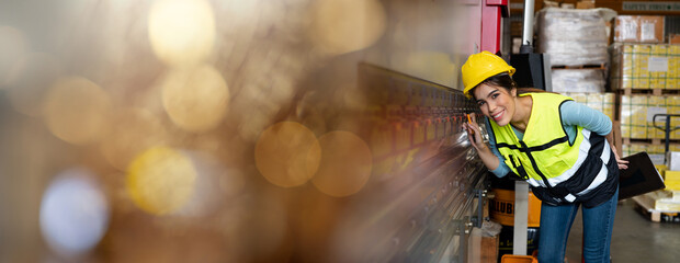 Portrait of female staff smiling with holding clipboard standing in warehouse with looking at camera, Banner cover design.