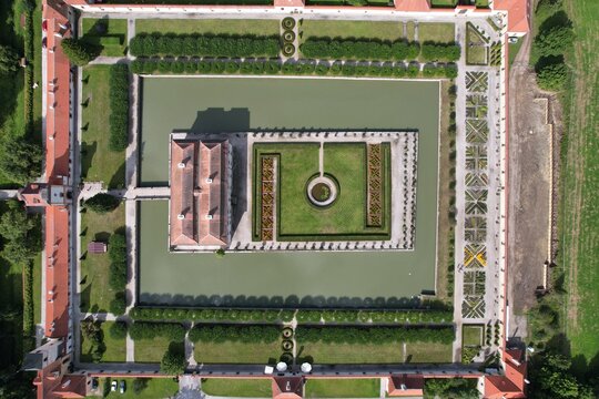 State castle Kratochv&iacute;le, picturesque renaissance residence surrounded by a moat and park, situated near Netolice, Bohemia, Prachatice district, Czech Republic-scenic aerial panorama view
