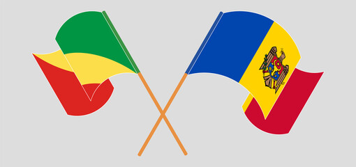 Crossed and waving flags of Republic of the Congo and Moldova