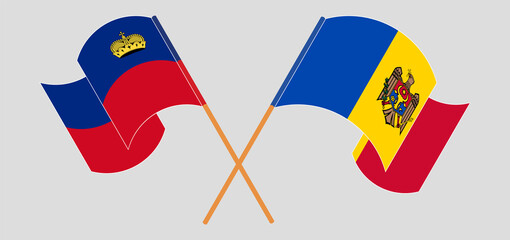 Crossed and waving flags of Liechtenstein and Moldova
