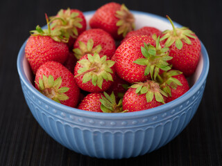 Fresh organic strawberries in a bowl