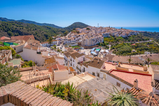 Panoramic view of whitewashed houses, rooftops and Mediterranean Sea, Frigiliana, Malaga Province, Andalucia