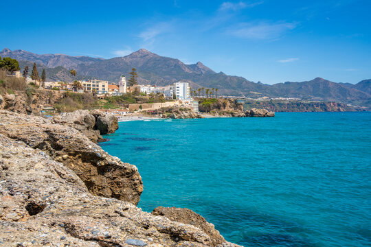 View of Parroquia El Salvador and coast in Nerja, Nerja, Malaga Province, Andalucia