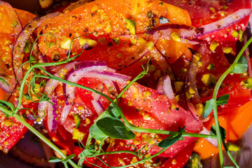 Salad with tomatoes, pea sprouts, onions