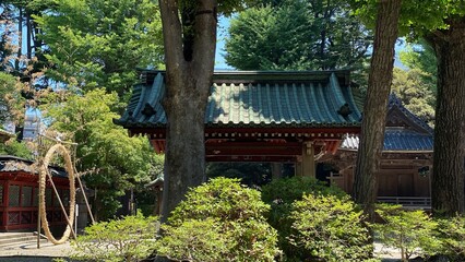 Fototapeta premium “Chozuya” holy purification fountain / well hut at “Nezu” shrine, during the traditional purification ceremony month, year 2022 June 28th