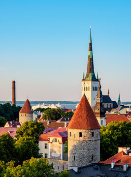 View over the Old Town towards St. Olaf's Church at sunset, UNESCO World Heritage Site, Tallinn, Estonia